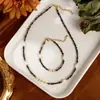 Diseño original pulsera de perla de agua dulce natural ojo de tigre piedra de vesícula negra pulsera brazalete versátil de alta gama al por mayor