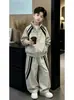 Conjunto de Otoño para Niños 2026 Estilo Nuevo: Elegante Conjunto Deportivo de Cortavientos y Pantalones de Dos Piezas para Niños, Atuendo Casual Infantil