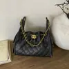 Bolso de mujer transfronterizo con un toque de lujo ligero, bolso de mano pequeño acolchado con cadena estilo Chanel, bolso tote de gran capacidad, moderno