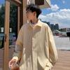 Otoño 2024 Nueva Camisa de manga larga de color liso de talla grande estilo Hong Kong para niños Camisa holgada M-5X en una tienda