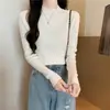 Suéter de punto de manga larga ajustado con cuello medio alto fino de primavera y otoño, suéter interior corto ajustado de otoño e invierno, camisa de fondo para mujer