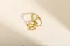 Anel Personalizado Europeu e Americano Cruzado em Aço Titânio com Formato de Cobra Que Não Desbota Anel em Aço Inoxidável Banhado a Ouro a Vácuo 18K Acessórios Hip-Hop