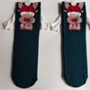 Calcetines de mano transfronterizos personalizados calcetines lindos de color monocromático a juego calcetines de media pantorrilla calcetines para las Cuatro Estaciones algodón Navidad novias calcetines de moda