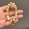 Pulsera nueva Guofeng imitación ágata cuentas de color natural no se decoloran cuentas de vidrio hilo caqui Ruyi joyería creativa al por mayor