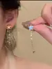 Presilha de Orelha com Franja de Estrela Super Fada Feminina Acessível Luxo Brincos Longos Elegantes Ins Nova Popularidade Nicho Novos Brincos Versátil