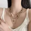 Colar Pingente Estrela e Lua Estilo Boho Joias Femininas Luxo Leve High-End Corrente de Clavícula Empilhada Acessórios Transfronteiriços Europeus e Americanos