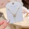 Collar de Borla de Perlas con Lazo Hueco, Cadena para Clavícula de Lujo Ligero de Nicho de Gama Alta, Collar Versátil de Estilo Elegante y Suave