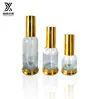 En stock botella base de 30 ml botella de aceite esencial botella de vidrio para aceite de masaje sub-botella cosmética botella con atomizador