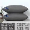 Un par de almohadas viene con una funda de almohada para dormir, núcleo de almohada de hotel, soporte para el cuello, uso doméstico, terciopelo de plumas para la siesta