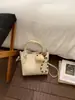 Conjunto de Bolsas de Mão Tendência deste Ano em Couro Macio com Padrão de Lichia 2026 Nova Moda Nicho Versátil Bolsa de Ombro para Mulheres