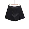 Atacado Exportação Transfronteiriça Roupas Femininas 2025 Outono e Inverno Estilo Europeu e Americano Cintura Média Pu Short Saia Culotes Feminina F71144