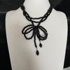 Nuevo y moderno collar con colgante de lazo de cuentas de cristal negro para mujer, cadena de clavícula con diseño apilado multicapa y moderno.