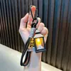 Llavero de Lámpara de Viento Mini Retro Llavero de Luz de Vela Electrónica Luz Ambiental Decorativa Colgante Pequeño para Bolsa de Regalo