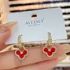 Pendientes festivos rojos de dos piezas de trébol para mujer Pendientes estilo Chanel Elegantes Moda Pendientes de red Pendientes de estilo frío