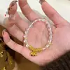 Pulseira com Pingente de Abóbora de Cristal Branco Estilo Chinês Novo Dourado Areia Estilo Igual da Loja de Ouro Puzuo para Mulheres, Joias de Alto Padrão Vento Frio