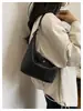 Bolso de Mano Simple de PU Tejido Tipo Dumpling para Mujer 2026 Nuevo Pequeño Nicho Versátil para Viajes Diarios Bolso Exquisito de Hombro Cruzado