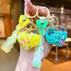 Llavero Creativo de Verano Colorido con Arena Movediza en Forma de Corazón Luminoso Colgante de Acrílico Transparente para Bolso de Niña Muñeca Máquina al por Mayor
