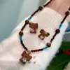 Collar de Cuentas Estilo Étnico Retro Ojo de Tigre Marrón Pendientes de Lujo Accesible Cadena para Clavícula de Elefante Bebé de Gama Alta para Mujer