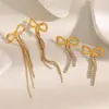 Brincos de Design Nicho Europeu e Americano Aço Inoxidável Banhado a Ouro 18K Laço Zircônia Brilhante Franja Fina Versátil para Uso Diário