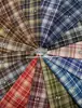 Nova Saia JK Xadrez de Tricô Outono e Inverno Roupas Infantis Roupas Femininas Padrão de Tecido Xadrez Fio Jacquard Tingido na Massa Venda por Atacado de Fábrica