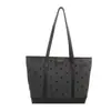 Bolsa de hombro grande de textura europea para el día a día 2026 con lazo de lunares casual elegante popular