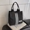 Bolsa Tote 2026 Primavera Nova Elegante Bolsa de Mão Portátil Bolsa para Marmita Grande Capacidade Bolsa Simples para Armazenamento