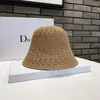 2025 nuevo sombrero de pescador tipo cubeta verano tejido hueco sombrero de paja hecho a mano gran protección solar parasol sombrero serie cubeta