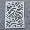 Patrón transfronterizo patrón de serpiente plantilla hueca creativa tela para ropa producción de graffiti hecho a mano
