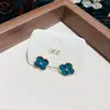 Pendientes de Flor de Trébol de Cuatro Hojas 2025 Nuevo Estilo Popular Pendientes de Alta Gama para Mujer con Diseño Único Pendientes
