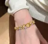 Xiaohongshu Pulsera Retro Deslumbrante Flor de Begonia con Pedrería Nuevo Estilo Chino Exquisita Joyería Fina para Mujer Accesorios Venta al por Mayor Productos de Nicho