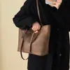 Bolsas de Mujer Transfronterizas 2026 Nueva Moda Retro Bolsas de Gran Capacidad para Mujeres Versátil Simple Casual Bolso de Hombro Tote