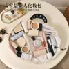 Bolsa de maquillaje portátil de gran capacidad, nuevo modelo 2024, bolsa de almacenamiento de cosméticos de viaje perezosa con cordón, organizador de mano