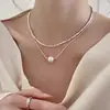 Colar de laço com pérolas e contas banhado a ouro real, corrente de clavícula versátil de nicho para o dia a dia, joia da moda e de alta qualidade para mulheres