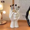 Suporte para pincéis de maquiagem com design de arte de rosto humano criativo transfronteiriço, organizador de mesa multifuncional para material de escritório, ornamento decorativo