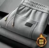 Direto do fabricante: Novas calças casuais de outono e inverno, com forro de fleece, espessadas, quentes, corte reto, caimento solto, adequadas para meia-idade e idosos, disponíveis para envio direto