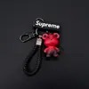 Novo Chaveiro Mecânico de Urso Pingente de Carro Desenho Animado da Moda Decoração Criativa para Bolsa de Casal Chaveiro de Silicone