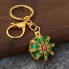 Llavero de estilo étnico con patrón octagonal, goteo de aceite e incrustaciones de diamantes, colgante de patrón vintage, regalo de recuerdo de viaje al por mayor