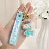 Llavero de Botella de Arena Líquida de Dibujos Animados, Pequeños Regalos para Puestos, Accesorios Acrílicos al por Mayor, Colgante Relleno de Aceite, Rasca Gatos Lindo de Regalo