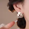 Pendientes Triangulares Retorcidos con Textura de Goteo de Aceite Europeos y Americanos para Mujer, Diseño de Lujo Accesible, Pendientes de Gama Alta, Elegantes y Versátiles