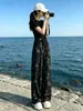 Conjunto Duas Peças: Blusa Preta de Manga Curta com Gola Redonda e Calça Wide Leg - Traje Esportivo Casual Emagrecedor para Mulheres - Verão 2026