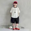 Traje Deportivo de Verano para Niños 2026 Nuevo Estilo Coreano Manga Corta Pantalones Cortos Conjunto de Dos Piezas de Moda Fresco Estilo Delgado de Verano para Niños Mayores