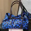 Bolso Tote de Aspecto Elevado de Nicho con Estampado de Leopardo para Mujer, Nuevo Estilo Primavera 2026, Bolso de Hombro o Axila Casual con Estilo