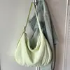 Bolsa de mão da moda e versátil em formato de bolinho para mulheres, nova coleção 2026, bolsa de ombro cruzado, bolsa de axila simples e estilosa, adequada para vendas transfronteiriças