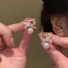 Pendientes de Lazo Suave Imitación Perla Estilo Francés 2026 Nuevo Modelo Más Vendido con un Toque de Alta Gama, Lujo Ligero, Pendientes Únicos y Hermosos