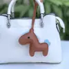 Nuevo Colgante de Bolso Miu Cherry Pony Accesorios de Muñeca de Cuero Colgante de Cordón Casual Colgante para Llavero de Coche