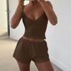 Europa y Estados Unidos mujeres calientes 2025 verano nueva moda camisola con cuello en V traje de shorts ajustado de color sólido al por mayor