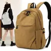 Mochila Deportiva Ligera de Color Sólido 2026 al por Mayor para Mujeres y Hombres, Mochila de Moda de Gran Capacidad Estilo Coreano Casual para Exteriores