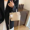 Bolso de Cubo Tejido de Moda para Llevar en la Mano para Mujer 2024 Nuevo Verano Bolso de Hombro Simple Casual Bolso Cruzado de Alta Gama