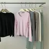 Colección de otoño e invierno: Camiseta de manga larga de algodón con textura de mousse, elástica y adelgazante, con cuello mao, estilo coreano, capa base versátil para mujeres jóvenes