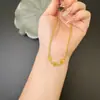 Collar de la Fortuna de Tres Caracteres Hueco Chapado en Oro Estilo Étnico Cadena de Buena Suerte Auspiciosa Joyería para Venta al por Mayor de Pequeños Productos de Yiwu